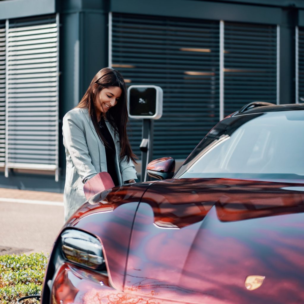 Woman Charging EV car